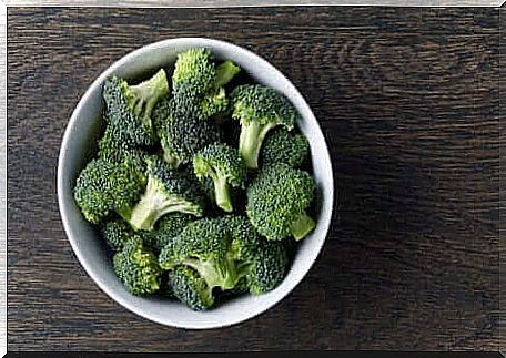 A bowl of frozen broccoli.