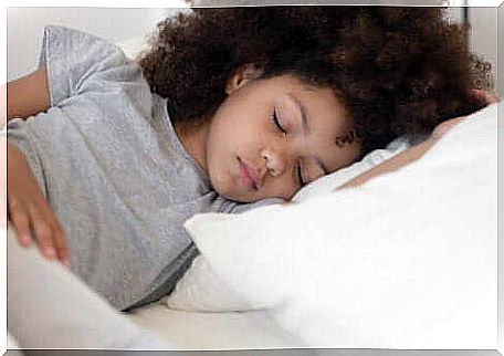 A young girl sleeping.